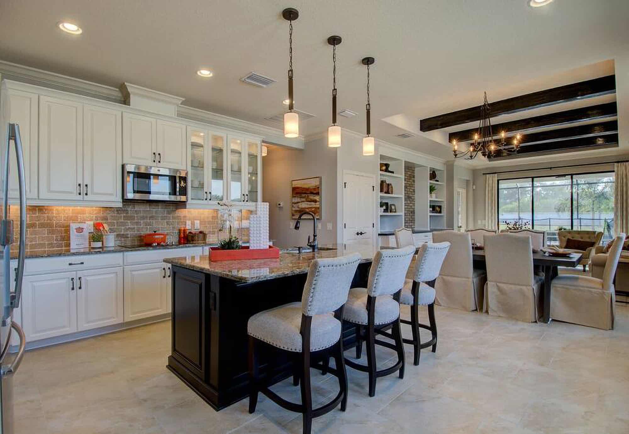 Kitchen and dining room at Braden single-family home by M/I Homes