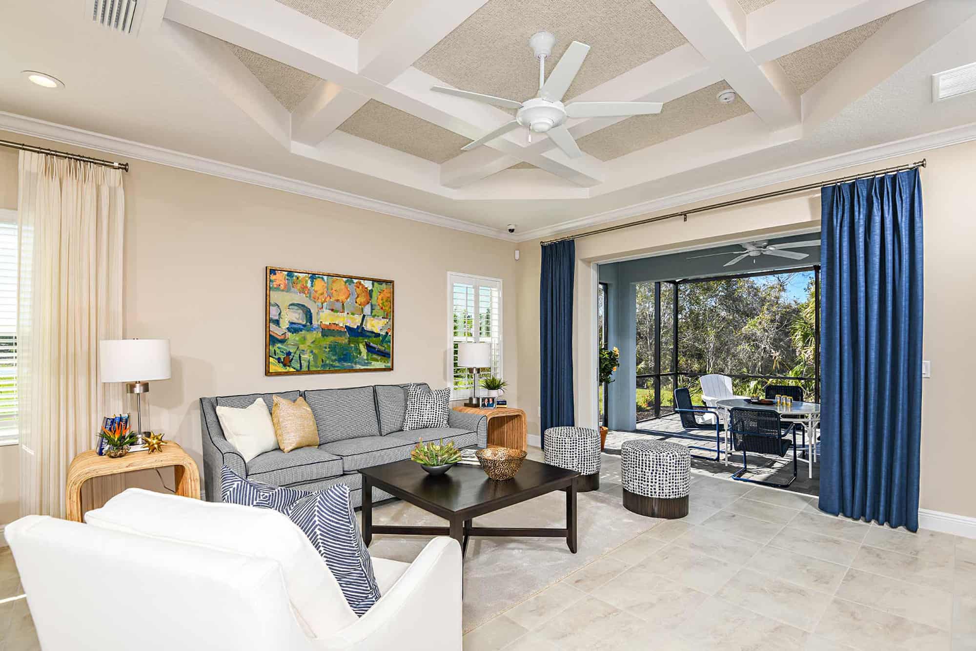 Living and sun room at Grand Park Sandcastle Neal Communities