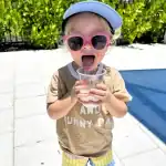 Toddler with iced drink